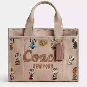 SOLD on Ⓜ️ Coach Peanuts Bag